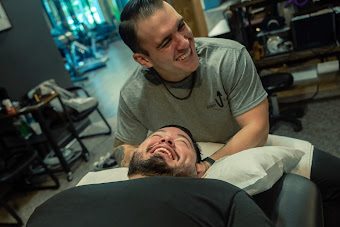 Dr. Richi Krottmayer from Elevate You  Physical Therapy helping client with neck pain. 